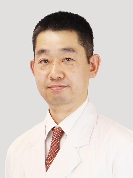 顔写真:岡 哲生